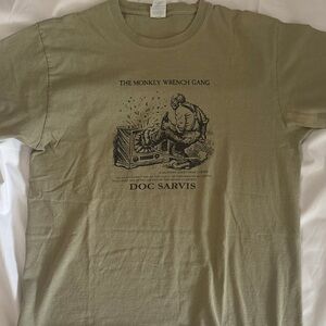 Port and Company Olive Green 'The Monkey Wrench Gang' Doc Sarvis Graphic Tee